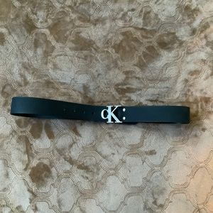 Black Calvin Klein medium men’s belt with CK silver buckle